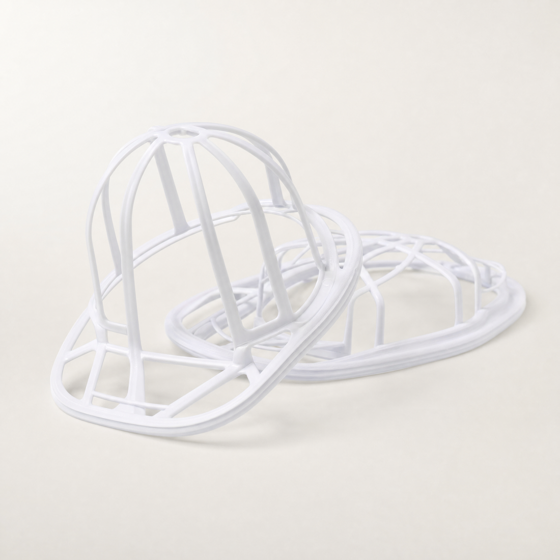 Le Cadre Casquette, support de maintien vendu par lot de deux